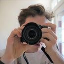 a woman taking a photo with her camera