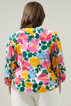 Vintage inspired abstract floral takes on the Martina Blouse. An easy-to-wear top with balloon sleeves to frame a relaxed fit blouse. A collarless split neck leads to a functional button front, while dainty ruffle details join the sleeves. Pair it with a mini skirt or wear it tucked into your favorite white trousers.- Button front- Ruffle details- Relaxed fit- Balloon sleeves- Color: Ivory MultiSize + Fit - Model is 5'8" and wearing size 2X- Measurements taken from size 2X - Chest: 24 1/2"- Leng Spring Multicolor Puff Sleeve Blouse, Multicolor Puff Sleeve Blouse For Spring, Multicolor Printed Puff Sleeve Blouse, Balloon Sleeve Floral Print Tops For Daywear, Multicolor Floral Print Tops For Daywear, Patterned Floral Print Blouse For Brunch, Multicolor Bishop Sleeve Tops For Spring, Casual Floral Print Top With Bishop Sleeves, Casual Blouse With Floral Print And Bishop Sleeves