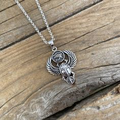 "Scarab necklace.. 1 9/16\" tall with bail by 1\" wide at the widest spot, cast and antiqued in sterling silver 925 with the eye of Ra and a ankh....the chain is 20\" long also in sterling silver 925 with a lobster catch" Symbolic Antique Silver Necklace Stamped 925, Bohemian Silver Ankh Jewelry, Bohemian Ankh Silver Jewelry, Symbolic Adjustable Necklace With Oxidized Finish, Symbolic Necklace With Oxidized Finish And Adjustable Fit, Symbolic Necklace With Oxidized Finish, Handmade Metal Ankh Necklace, Symbolic Pendant Necklaces Stamped 925, Symbolic Pendant Necklace Stamped 925