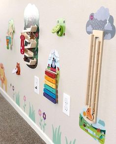 Stick and play toys for kids playroom Toys On The Wall, Nursery Sensory Wall, Playroom Wall Activities, Interactive Playroom Wall, Interactive Wall For Kids, Playroom Wall Ideas, Activity Wall, Play Wall, Music Room Wall