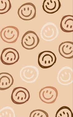 an image of a smiley face pattern on a beige background with brown and white circles