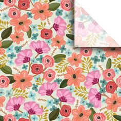 a floral wallpaper with pink and blue flowers