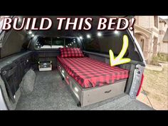 the inside of a car with a bed in it