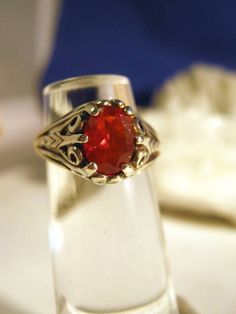 Mexican Fire Opal Sterling Filigree ring by GriffinsNestJewelry, $154.98 Heirloom Style Red Gemstone Jewelry, Heirloom Style Red Ruby Ring With Filigree, Antique Red Ruby Birthstone Ring, Red Ruby Ring With Filigree For A Gift, Unique Red Birthstone Jewelry, Red Filigree Rings For Gifting, Red Ruby Filigree Ring As Gift, Antique Red Birthstone Jewelry, Victorian Style Filigree Ring In Red