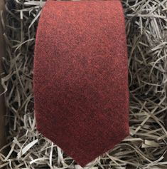 The Skyrocket Men's Tie is available in three widths from skinny to wode. This is a burnt orange cotton men's tie ideal for a rust wedding, formal wear and for a vintage feel. This set makes an ideal men's gift, groomsmen gifts and formal wedding attire as they come with stunning free gift wrapping. If you opt for free gift wrapping, we will send your item beautifully wrapped in a cardboard box with string and a gift tag for your message. Our ties, bow ties and pocket squares can be bought in a Fitted Red Neckwear For Gift, Red Fitted Neckwear For Gift, Red Adjustable Tie For Wedding, Adjustable Red Suit And Tie Accessories For Wedding, Adjustable Red Ties For Wedding, Red Adjustable Ties For Weddings, Red Adjustable Wedding Ties, Red Dapper Tie For Wedding, Red Dapper Ties For Wedding