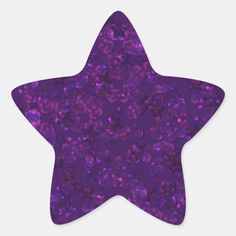 a purple star sticker with circles on it