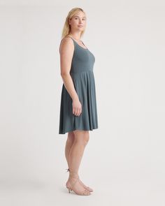 Our popular Tencel Jersey Fit & Flare Dress now comes in a mini version! Made with the same luxurious Tencel™ fabric , this dress this dress features a flattering fit-and-flare silhouette that accentuates your curves and creates a feminine look. The mini length adds a fun and flirty touch, making it perfect for a night out or a casual day in the sun. Dress it up with heels and statement jewelry for a night out, or pair it with sneakers and a denim jacket for a casual daytime look  | Quince | Wom A-line Sundress For Daywear, Fit And Flare Sundress Mini Length, Fitted Mini Hem Daywear Dresses, Spring Sleeveless Mini Dress With Flattering Silhouette, Fit And Flare Sundress In Mini Length, Fit And Flare Midi Sundress, Chic Mini Hem Dresses For Daywear, Summer Fit And Flare Sundress, Flattering Fit And Flare Knee-length Mini Dress