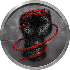 a black and red chain on a round metal object with a white background in the center