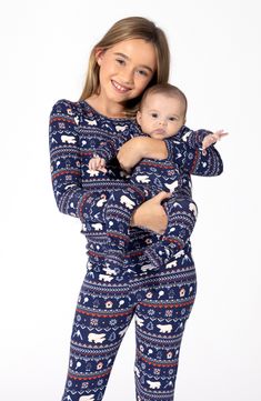 Convertible feet let you adjust the coverage of these supersoft pajamas made from breathable, moisture-wicking fabric to give your kiddo maximum comfort. A convenient two-way front-zip closure also ensures quick and easy changes. This item is designed to fit snugly, as it is not flame resistant Two-way zip closure with chin guard Fold-over cuffs on sizes Newborn to 3–6 months help prevent accidental scratches Gripper feet Moisture-wicking fabric engineered for dryness and comfort 95% rayon, 5% s Snug Long Sleeve Sleepwear, Super Soft Long Sleeve Onesie For Playtime, Playful Long Sleeve Super Soft Sleepwear, Super Soft Long Sleeve Onesie For Bedtime, Long Sleeve Super Soft Onesie For Bedtime, Long Sleeve Onesie For Bedtime, Family Matching Long Sleeve Onesie For Loungewear, Blue Nursing Friendly Sleepwear, Nursing Friendly Long Sleeve Sleepwear