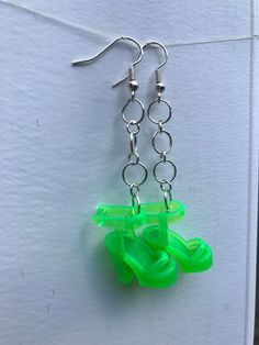 Unique Barbie Shoe earrings. Lightweight and comfortable! You will get tons of compliments!! If you have any questions about my product, please reach out to me! Diy Barbie Shoe Earrings, Green Plastic Summer Jewelry, Plastic Drop Earrings For Party, Handmade Clear Plastic Earrings, Green Plastic Earrings For Gifts, Green Resin Earrings For Summer, Green Hoop Earrings For Party With Ear Wire, Trendy Clear Hoop Earrings For Parties, Trendy Clear Drop Earrings