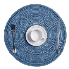 a blue place setting with silverware on it