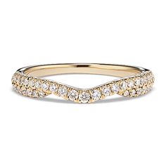 a yellow gold wedding band with white diamonds