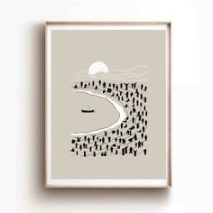 a framed art print with people walking on the beach