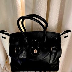 This Is A Sought After Ralph Lauren Ricky Bag. It Is Black And White Beautifully Handmade Italian Leather. Lock, Key, Strap And Bag Included. New And Never Used. High-end Black Satchel For Errands, High-end White Shoulder Bag For Travel, White Satchel Shoulder Bag With Palladium Hardware, Luxury White Bag With Palladium Hardware, Designer White Shoulder Bag With Palladium Hardware, Luxury White Handheld Satchel, White Top Handle Bag With Palladium Hardware, Luxury White Bags For Errands, Luxury White Shoulder Bag For Travel