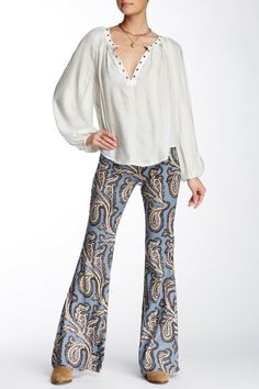 Free People Paradise Printed Flared Linen Blend Pant Blue Combo OB485569 Sz S NWT For Urban Outfitters - Side zip closure - Wide leg - Allover print - Approx. 10" rise, 34" inseam (size S) - Imported Fiber Content 52% linen, 46% rayon, 2% spandex Care Machine wash cold *All store items are department store purchases which means may have been tried on and handled by retail store customers    *Please keep in mind that each style may fit differently, and it is your responsibility to& Patterned Printed Bottoms For Spring, Paisley Print Trousers For Spring, Wide Leg Paisley Print Bottoms For Spring, Spring Paisley Print Trousers, Wide Leg Bottoms With Paisley Print For Spring, Spring Wide Leg Bottoms With Paisley Print, Spring Paisley Print Patterned Bottoms, Spring Patterned Bottoms With Paisley Print, Chic Printed Patterned Pants