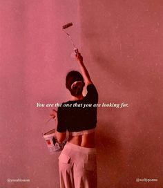 a woman holding a paint can and brush in her hand with the words you are the one that you are looking for