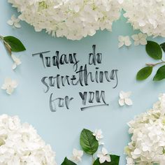 some white flowers and the words today do something for you