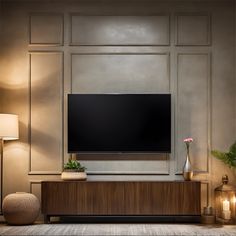 a flat screen tv sitting on top of a wooden cabinet in front of a wall