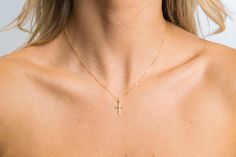 Show off this beautiful gold filled patterened cross that hangs from a dainty shimmering 14k gold filled chain and finished off with a 14k gold filled round spring clasp. Very sparkly and shimmery. Great to wear on its own or for necklace layering. Makes the perfect gift for a loved one or yourself! ITEM DETAILS * * 14k Gold Filled/Sterling Silver Cross 10.2x16.4mm * * 14k Gold Filled/Sterling Silver flat cable chain *Picture Size: 16 inches (Picture 2) All of the components in this piece are 14 Dainty Yellow Gold Cross Necklace With Adjustable Chain, Dainty Yellow Gold Cross Pendant Necklace, Minimalist Gold Crucifix Jewelry, Gold Cross Necklace With Dainty Chain, Dainty 14k Gold Cross Necklace Gift, Dainty 14k Gold Cross Necklace As A Gift, Minimalist 14k Gold Crucifix Jewelry, Dainty Crucifix Clavicle Chain Jewelry, Gold Minimalist Cross Pendant Jewelry