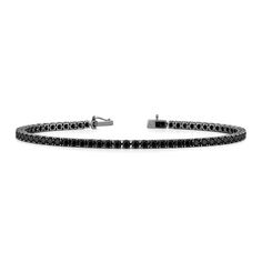 This white gold with black rhodium bracelet gives the classic tennis bracelet a refined appeal. Majestically masculine, this bracelet comes traced by a series of black diamonds on a four prong setting, adding an edge to your sharpest look.