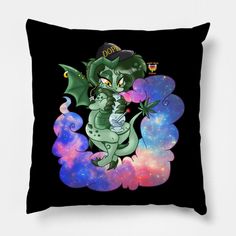 a black pillow with an image of a green dragon on it's back and stars in the background