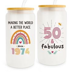 two white jars with the words 50 and fabulous printed on them, one has a straw in it