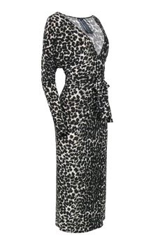 Wrap yourself up in some seriously ferocious style with this Norma Kamali dress! The classic maxi dress is given a safari chic upgrade with a luxe leopard print design in an easy and breezy wrap silhouette. The perfect wow piece to dress up and down! Style with strappy sandals and a wide brim hat for a boho-inspired ensemble, or get dolled up for your next cocktail party with sparkly pumps and a statement necklace. No matter where or how you rock this frock, you’re guaranteed to be looking total Black Fitted Belted Maxi Dress, Chic Leopard Print Maxi Dress For Fall, Fitted Belted Maxi Dress For Fall, Belted Fitted Maxi Dress For Fall, Fall Chic Leopard Print Maxi Dress, Elegant Leopard Print Maxi Dress For Fall, Fitted Leopard Print Maxi Dress For Spring, Elegant Leopard Print Maxi Dress For Evening, Spring Leopard Print Maxi Dress