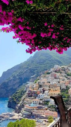 the view of positi on the amalfic coast from an outdoor cafe