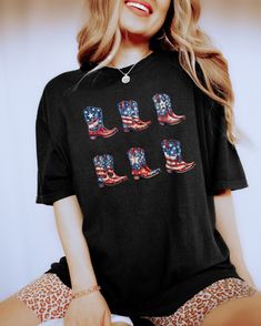 Casual Short Sleeve T-shirt For Labor Day, Casual Black Tops For 4th Of July, Fall Patriotic Crew Neck T-shirt, Patriotic Crew Neck T-shirt For Fall, Black Short Sleeve Tops For Country Concerts, Black Letter Print Tops For Country Concerts, Black Graphic Print T-shirt For 4th Of July, Black T-shirt With American Flag Print For Summer, Black T-shirt With Letter Print For Country Concerts