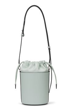 A scaled-down bucket bag with a modern silhouette is crafted of smooth leather offering optional wear with top carry handle or an adjustable, crossbody strap. 6"W x 9"H x 5"D 24" strap drop Drawstring closure Top carry handle; removable, adjustable crossbody strap Lined Leather Imported Spring Bucket Satchel With Adjustable Strap, Spring Bucket Bag With Detachable Strap For Errands, Modern Spring Bucket Bag With Top Handle, Modern Bucket Satchel For Errands, Modern Top Handle Bucket Bag For Errands, Modern Spring Bucket Bag With Top Carry Handle, Spring Bucket Bag With Removable Pouch For Errands, Modern Satchel With Adjustable Strap For Spring, Modern Crossbody Bucket Bag For Shopping