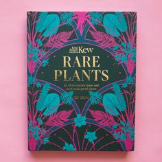 the new rare plants book on a pink background with blue and green flowers in it