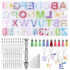 PRICES MAY VARY. 【Great Value Set】Shynek silicone keychain mold set comes with a piece of letter & number silicone mold, 20 pieces of keychain with chain, 20 pieces of keychain tassels, 100 pieces of screw eye pins and a pin vise with 10 drill bits for resin casting keychain making 【Multifunctional Epoxy Mold】Our resin keychain mold is made of quality durable silicon by advanced techniques, flexible and tear proof, easy to clean and recyclable. With 26 alphabet letters and 10 numbers that can be Classroom Decoration Ideas, Small Gifts For Friends, Resin Chain, Resin Jewelry Molds, Epoxy Resin Molds, Resin Products, Epoxy Tumblers, Silicone Resin Molds, Jewellery Moulds