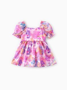 Adorable and dreamy, this Care Bears Toddler Dress will transport your little one to a magical world with its princess-style silhouette, puff sleeves, sparkling tulle, and lovely Care Bears print.
-Product features: Care Bears print.
-Fabric characteristics: Soft and comfortable.
-Piece of product: 1 dress.
-Sleeves: Puff.
-Style: Dreamy and lovely. Cute Toddler Outfits, Dress Sleeves, Princess Style, Care Bears, Bear Print, Consumer Products, Baby Clothes Shops, Toddler Dress, Tulle Dress