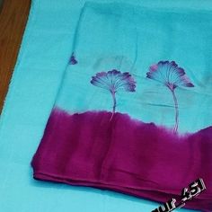 a blue and purple cloth with flowers on it