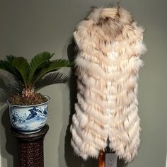 Bring A Chic Appeal To Everyday Ensembles With A Genuine Fur Vest. Designed From Tiers Of The Softest Fix And Rabbit Fur, This Gorgeous Sleeveless Silhouette Wraps The Neck To Fight Off The Season’s Chill. Layer The Statement Piece Over Lightweight Sweaters When Transitioning From One Season To The Next. Measures About 32” Long And 21” In Width. Excellent Condition. Non Smoking Home. Lightweight Sweaters, Fox And Rabbit, Fur Vest, Rabbit Fur, Light Weight Sweater, The Next, Jackets & Coats, Jackets For Women, Conditioner