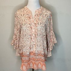 Vince Camuto Womens Blouse Sheer Floral Ruffle Sleeve V Neck Pink Sz S Nwt. Approximate Measurements - Shoulder To Shoulder: 15 1/4” - Armpit To Armpit: 19 3/4” - Length Of Back: 27” Spring Vacation Blouse With Ruffle Hem, Floral Print Ruffle Sleeve Blouse For Vacation, Chic Rayon Blouse With Ruffle Sleeves, Spring Short Sleeve Blouse With Boho Print, Feminine Ruffled Blouse For Vacation, White Ruffle Sleeve Blouse For The Beach, Flowy Ruffle Hem Blouse For Vacation, Feminine Rayon Blouse For Vacation, Flowy Bohemian Blouse