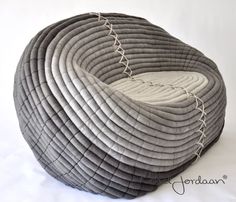 an unusual chair made out of woven material