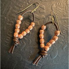 @Pixielife Hand Crafted Brown Leather Knotted Loop Earrings With Ethiopian Copper Beads Hypoallergenic Bronze Finish Ear Hooks Southwestern Boho Style Dangling Beaded Leather Cord Earrings Are Unique And Beautiful. Coordinating Jewelry May Still Be Available In This Closet. 2” Length 4 Mm Copper Beads 2 Mm Leather Cord Unique Jewelry Handmade By Joallyn Of Pixie Life 541 Aesthetic Design Ideas Artsy Eclectic Leather Copper Beads Accessories Accessory Hand Crafted Bohemian Southwest Southern Sout Beaded Leather Earrings, Wood Jewellery Handmade, Giant Earrings, Leather Cord Earrings, Leather Earrings Ideas, Boho Leather Jewelry, Cord Earrings, Aesthetic Design Ideas, Southern Jewelry