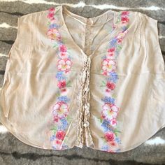 **Price Firm - Closet Clearance** Free People Peasant Blouse. Washed But Never Worn. Boho Fit And Style. Runs Loose And Large But Short On Torso. Delicate Button Details With “Ruffle” Design Down The Front And Back. Slits On The Sides To Allow Belts And Waistband To Show. Please Review Photos. Priced To Sell Sleeveless Floral Embroidery Vacation Blouse, Summer Festival Blouse With Floral Print, Pink Bohemian Tops For Daywear, Bohemian Pink Tops For Daywear, Pink Bohemian Daywear Tops, Floral Embroidery Sleeveless Beach Blouse, Floral Embroidered Sleeveless Blouse For Beach, Floral Embroidery Sleeveless Blouse For Beach, Spring Festival V-neck Blouse