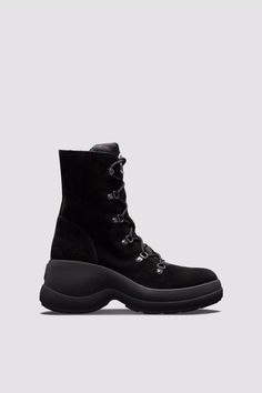 Black Resile Trek Lace-Up Boots - Boots for Women | Moncler US Winter Lace-up Boots With Rubber Sole In Calf Leather, Calf Leather Lace-up Winter Boots, Winter Calf Leather Boots With Vibram Sole, Winter Lace-up Boots With Reinforced Heel In Calf Leather, Lace-up Calf Leather Winter Boots, Winter Lace-up Calf Leather Boots, Lace-up Calf Leather Boots For Winter, Luxury Winter Boots For Outdoor, Luxury Winter Outdoor Boots