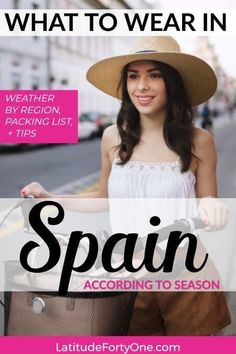 a woman wearing a hat and holding a bike with the words spain in spanish on it