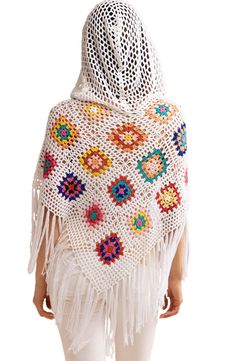 Granny-square crochet adds a pop of color to a poncho that's topped with a hood for extracozy style. 21" x 27" Pull-over 100% acrylic Hand wash cold Imported One Size Yarn Poncho For The Beach, Fall Beach Crochet Shawl, Fall Beach Shawl With Crochet Details, White Crochet Shawl For The Beach, Winter Granny Square Poncho One Size, Bohemian Granny Square Poncho For Festivals, Fall Bohemian Poncho With Granny Squares, One Size Multicolor Granny Square Poncho, Multicolor Granny Square Poncho One Size