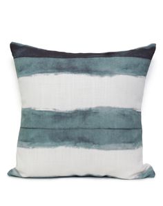 a blue and white pillow with horizontal stripes on the front, sitting against a white background