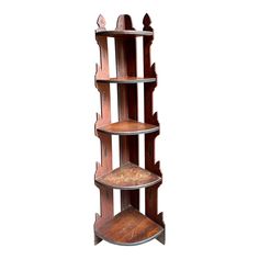 a tall wooden shelf with three shelves on each side