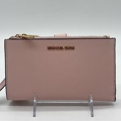 Brand New With Tag Michael Kors Large Double Zip Wallet Wristlet Color: Light Pink Michael Kors, The Signature Logo Jet Set Double Zip Wristlet Features: Zip Closure Interior: 2 Top Zip Pockets Exterior: 6 Credit Card Pockets, 1 Window Pocket, 1 Phone Pocket, 3 Slip Pockets Fits Up To Iphone 7+ - 8+ Approx. 7.25" W 4' H X 1.5" D Michael Kors Clutch Wallet With Removable Pouch, Everyday Michael Kors Rectangular Clutch, Michael Kors Rectangular Everyday Clutch, Michael Kors Clutch With Zipper Closure, Michael Kors Clutch Wallet With Card Slots, Michael Kors Rectangular Clutch For Travel, Michael Kors Clutch With Card Slots, Leather Wristlet With Card Slots, Michael Kors Pink Wallet With Zipper Closure