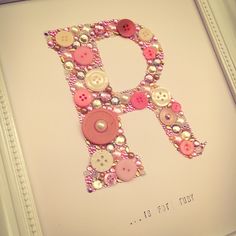 the letter p is made out of buttons