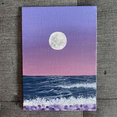 a painting of the ocean with a full moon in the sky