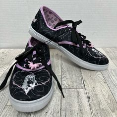 Nightmare Before Christmas Sneakers. Lace Up. Black And Pink. Jack Skellington And Sally On Toes. Bat Tie On Laces. Size 9 Pink Disney Sneakers With Round Toe, Disney Pink Round Toe Sneakers, Christmas Sneakers, Jack Skellington And Sally, Disney Nightmare Before Christmas, Disney Shoes, Black And Pink, Jack Skellington, Nightmare Before