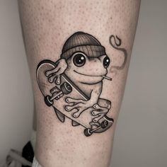 Frogs have long been a popular tattoo choice due to their symbolic meaning and visually appealing look. As amphibious creatures, frogs represent trans... Cowboy Frog Tattoo, Jade Tattoo, Middle Finger Tattoos, Modern Art Tattoos, Frog Tattoo, Animal Tattoo Ideas, Cool Wrist Tattoos, Mushroom Tattoos, Frog Tattoos