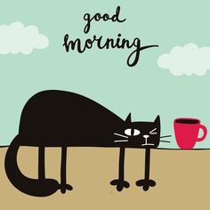 there is a cat that is laying down next to a coffee cup with the words good morning on it